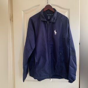 New without tags Polo Golf Jacket. Color is Navy Blue.  Size is M.